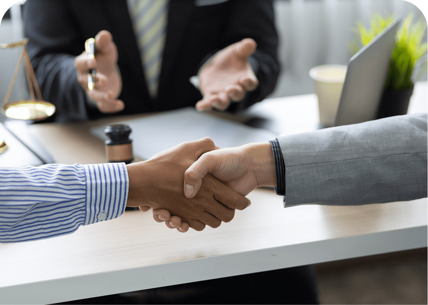 Business handshake in office setting