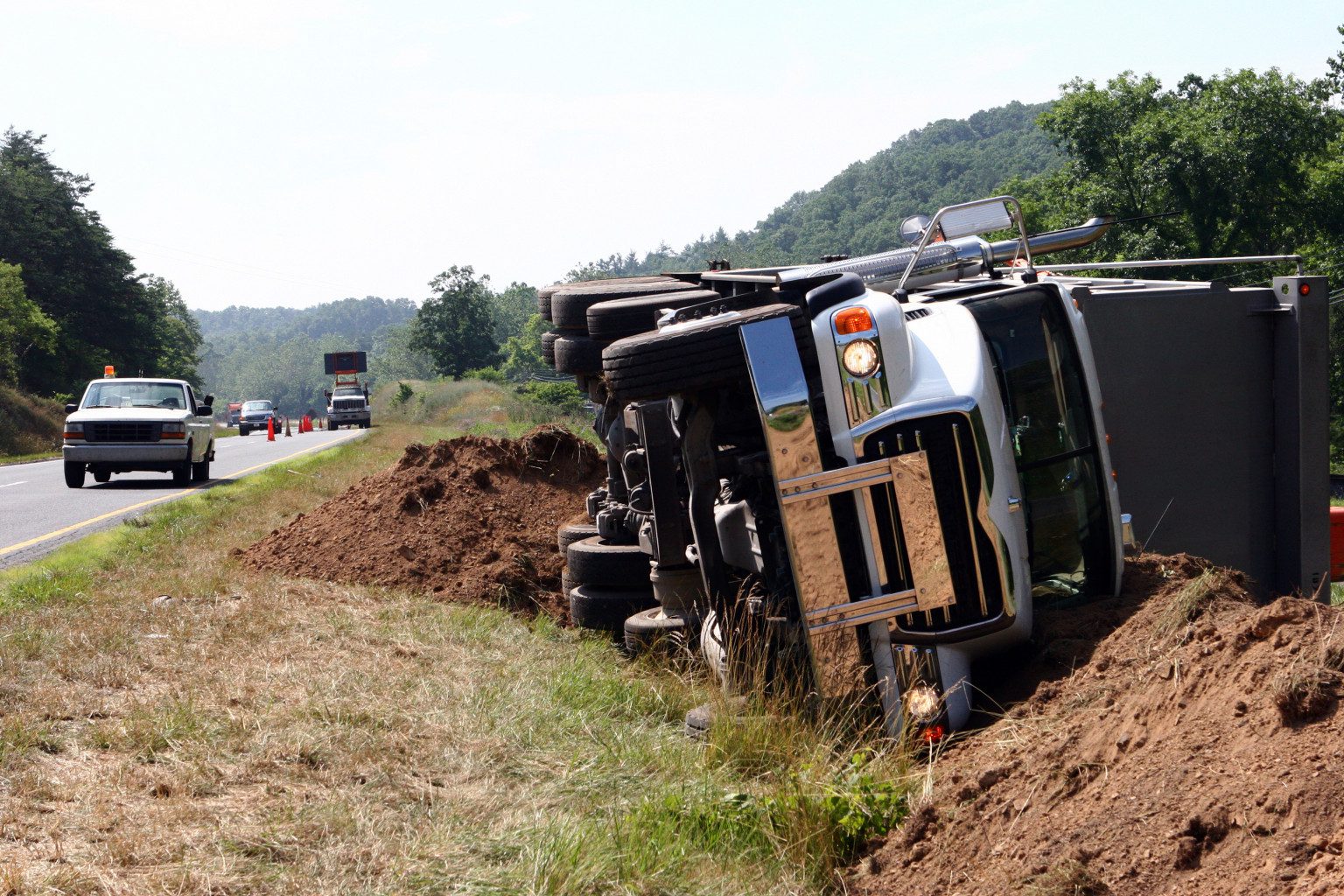 Traffic cones near overturned vehicle