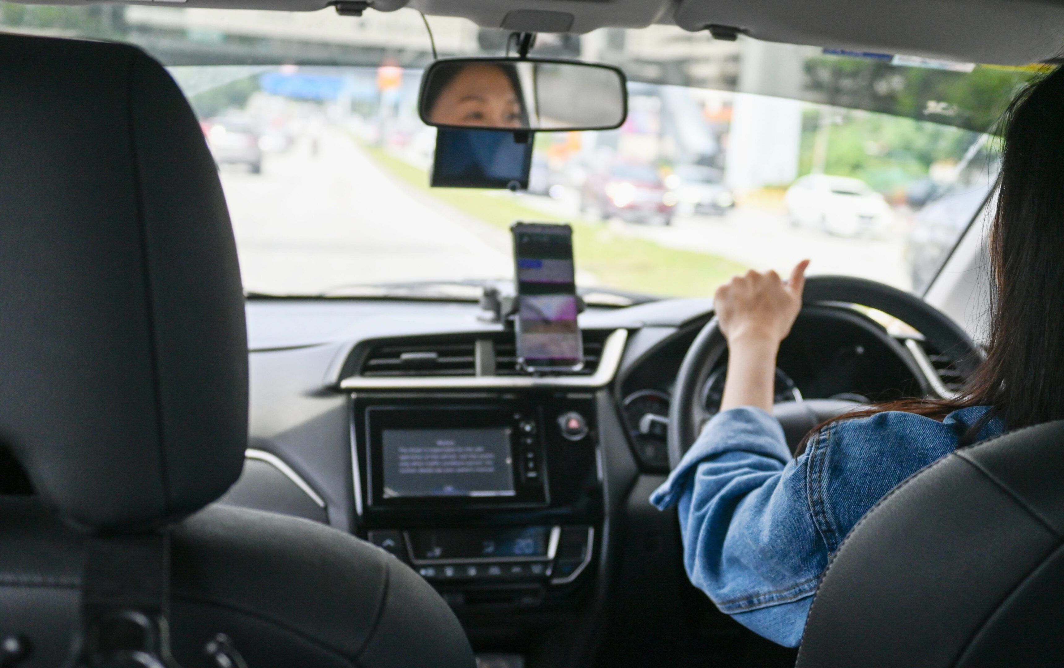 Interior view of car with driver