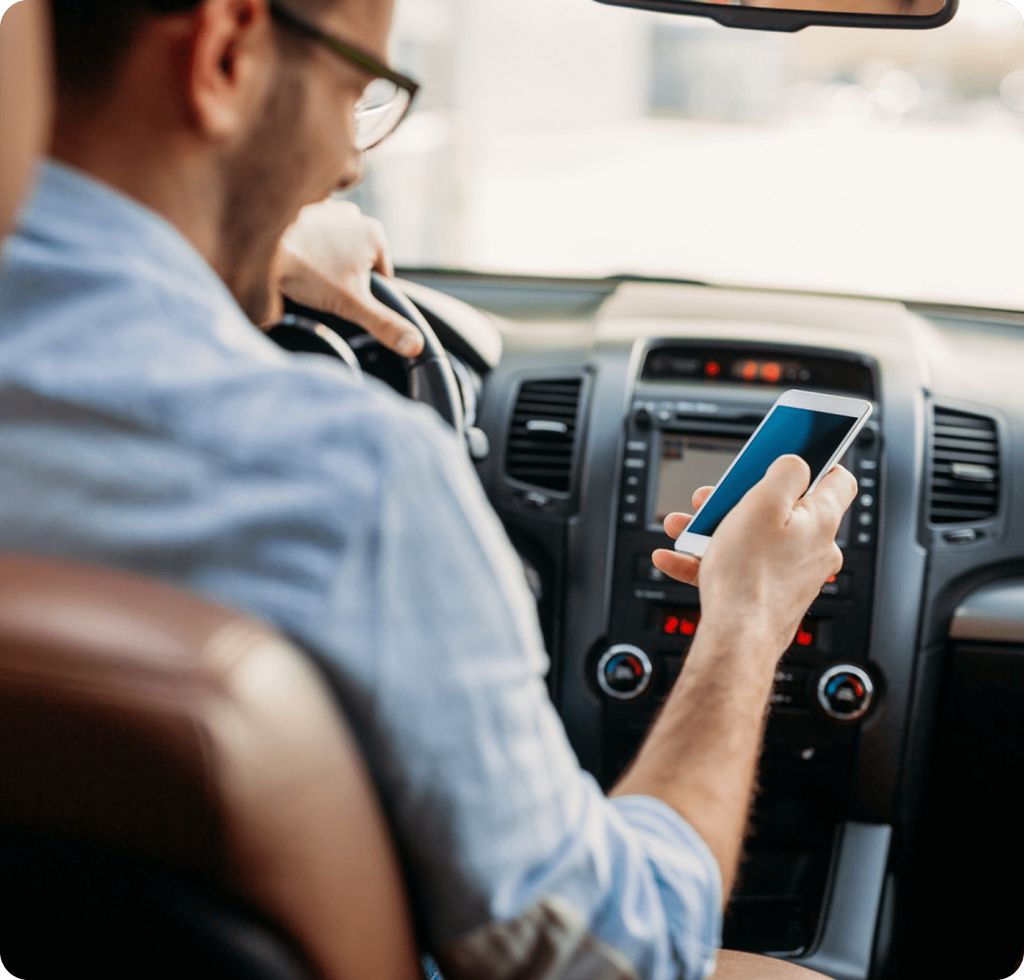 Distracted driving with phone in hand