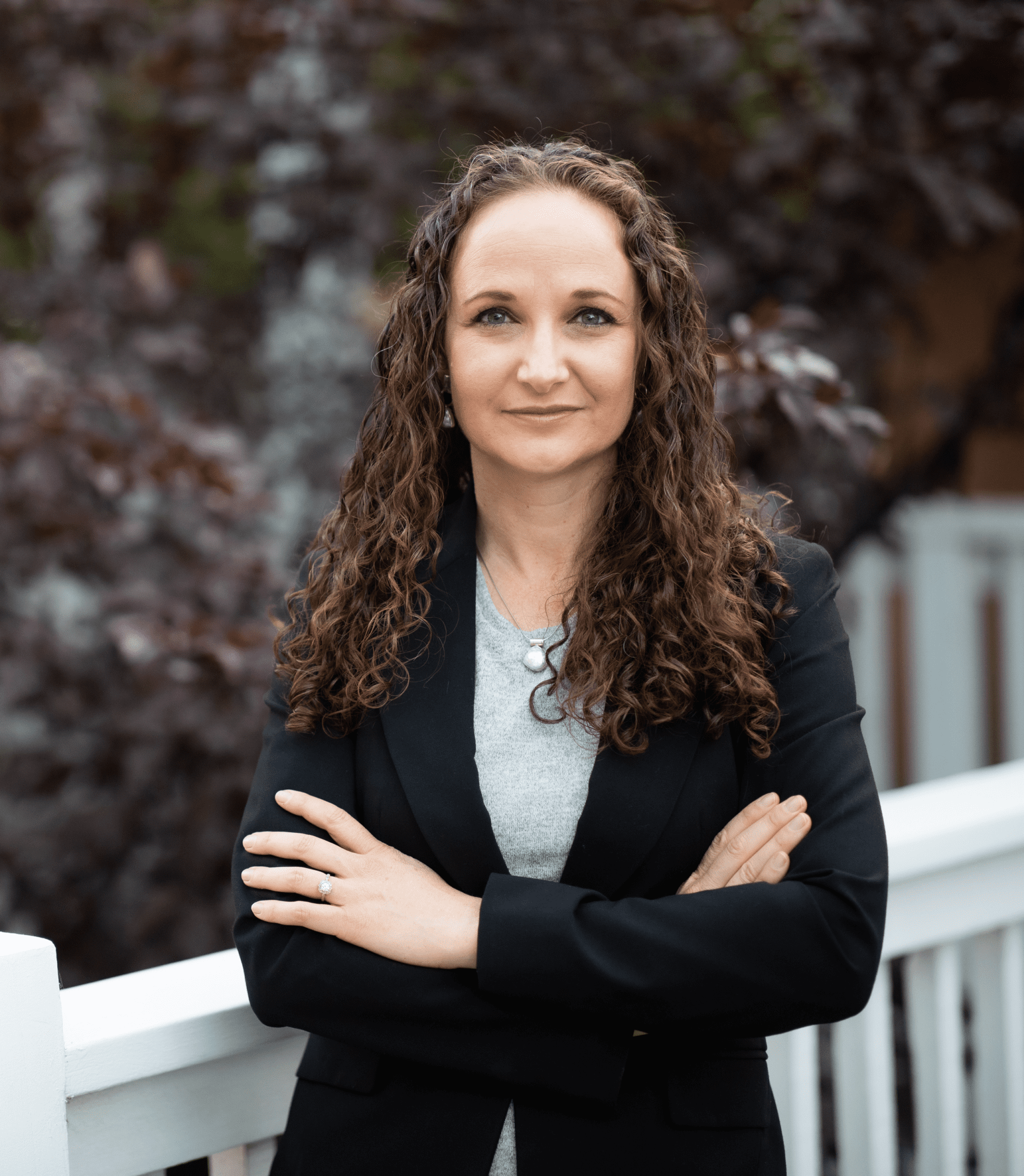 Confident professional woman with curly hair